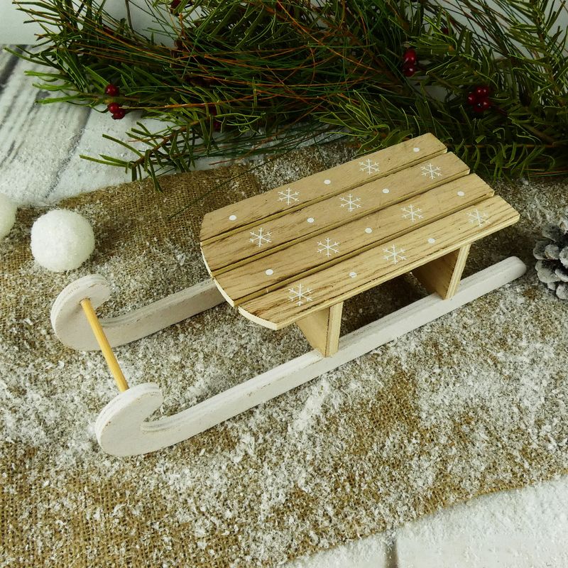 Dřevěné dekorační sáňky s potiskem vloček- délka 30 cm