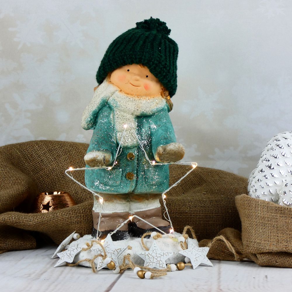 Zimní figurka dítěte- holčička v zeleném kabátku s LED hvězdou, 39 cm