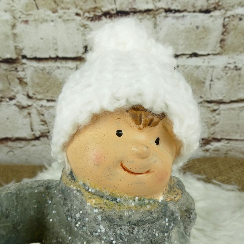 Zimní figurka- chlapeček na houpacím koni, 23 cm