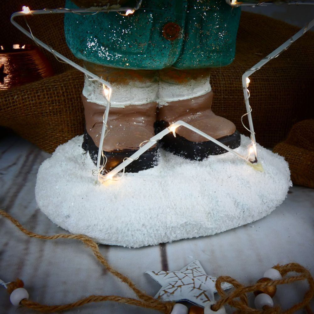 Zimní figurka dítěte- holčička v zeleném kabátku s LED hvězdou, 39 cm